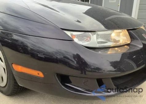 1999 Saturn Sc1 z USA, uszkodzony, nr VIN 1G8ZP1283XZ324457